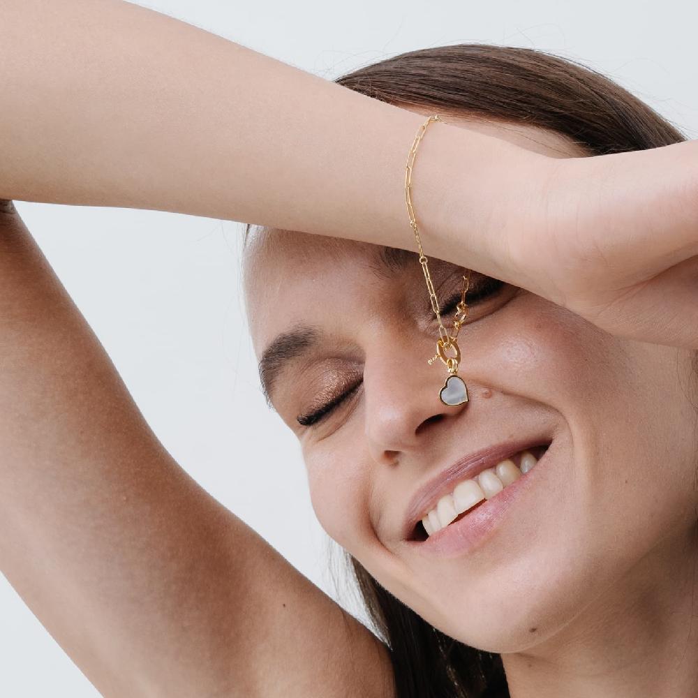 Unoaerre Bracciale in oro con pendente in madreperla | UNOAERRE Gioielli Nuova