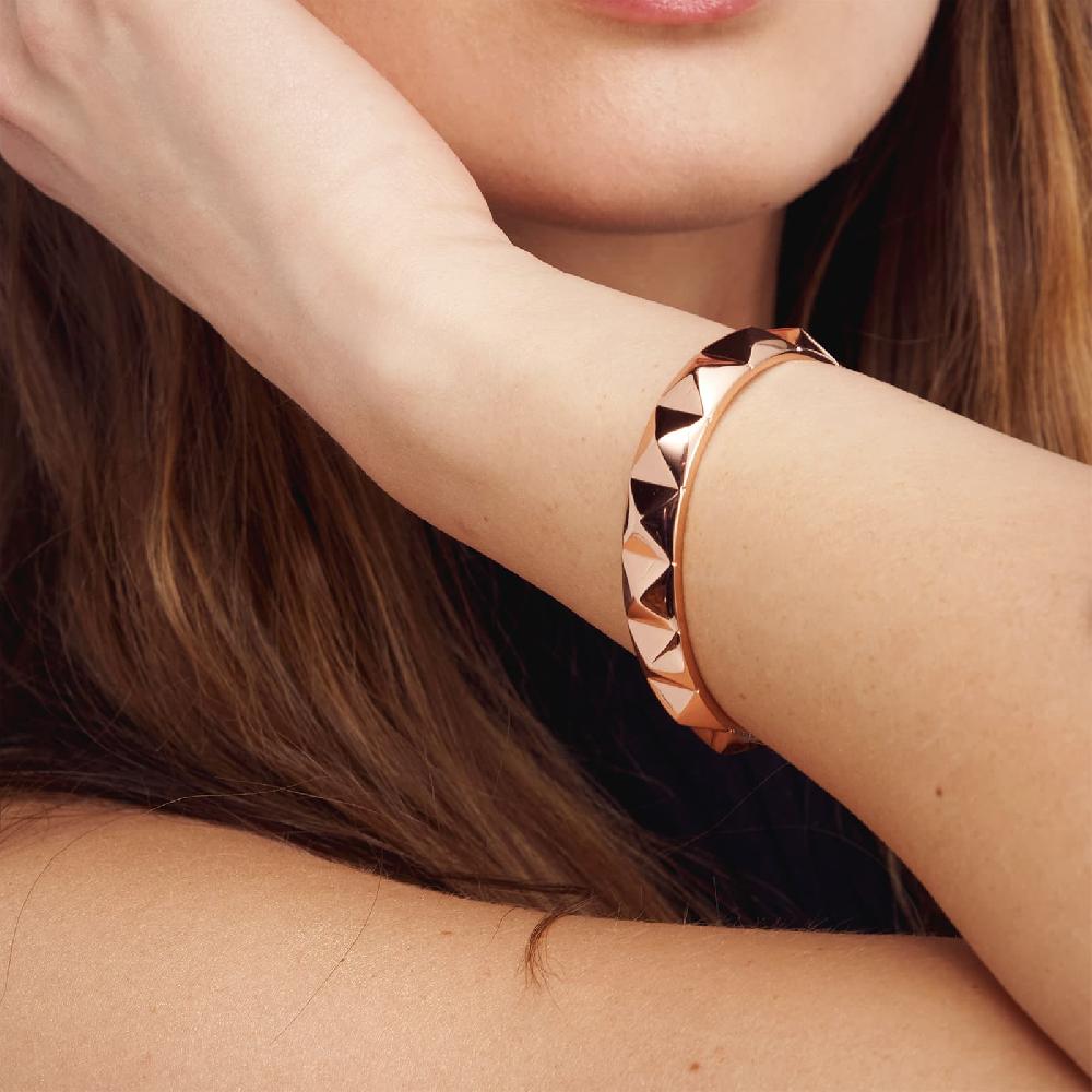 Unoaerre Bracciale rigido in bronzo dorato rosa piramidi | UNOAERRE Gioielli Sostegno trimestrale
