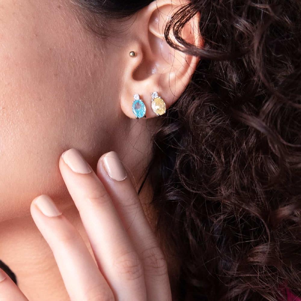 Unoaerre Orecchini in argento con e zicornia cubica azzurra | UNOAERRE Gioielli Officina